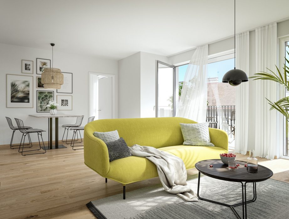 Wohnzimmer mit gelbem Sofa, runden Couchtisch, Fenster mit weißen Vorhängen, Esstisch mit vier Stühlen und Wandbildern.